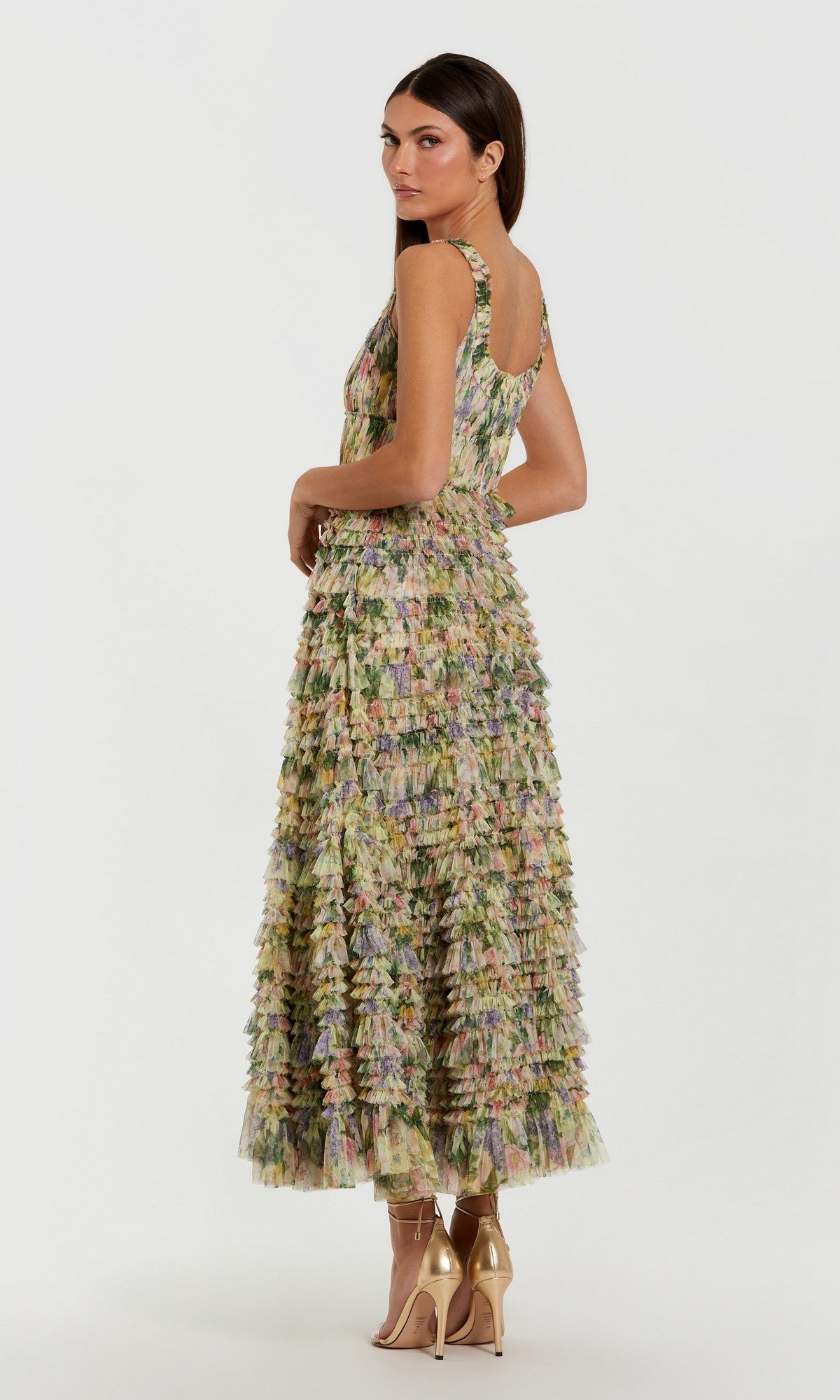 A woman wearing the Mac Duggal 8299 Tea-Length Party Dress and gold high heels stands posed sideways against a plain white background.